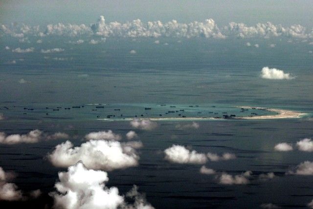 Japan warns of Chinaâ��s militarization in South China Sea anew