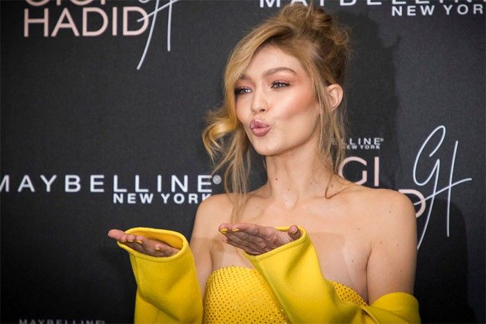 Model Gigi Hadid poses for photographers upon arrival at the Gigi Maybelline party in London, Tuesday, Nov. 7, 2017. 