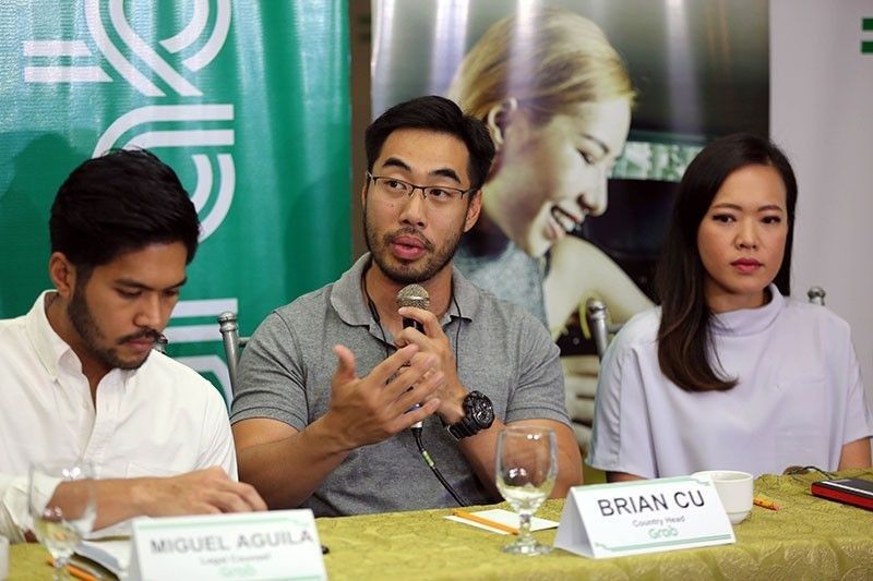 Grab to hide passengers' destinations, implement auto-accept feature