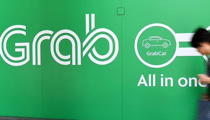 Singapore watchdog fines Grab, Uber $9.5-million over merger