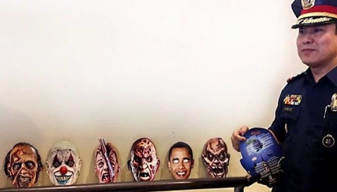 PNP exec behind Obama mask visiting China