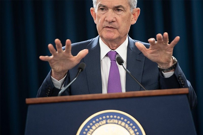 Fed leaves key US interest rate unchanged, notes slowing investment