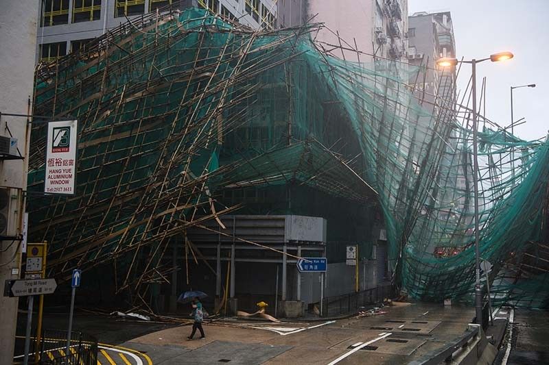 Massive cleanup in Hong Kong after typhoon brings trail of destruction