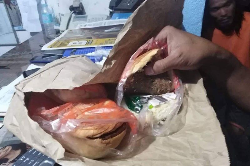 Cops seize drugs hidden in burger