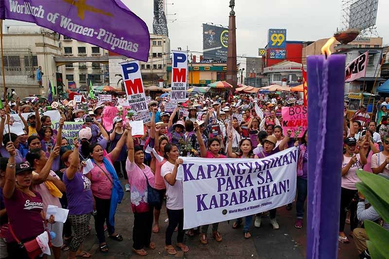 Duterte, accused of misogyny, lauds women in society