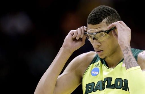 NBA hopeful, stricken by illness, returns to basketball