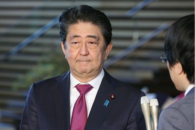 Japan cabinet approves bill to accept foreign workers