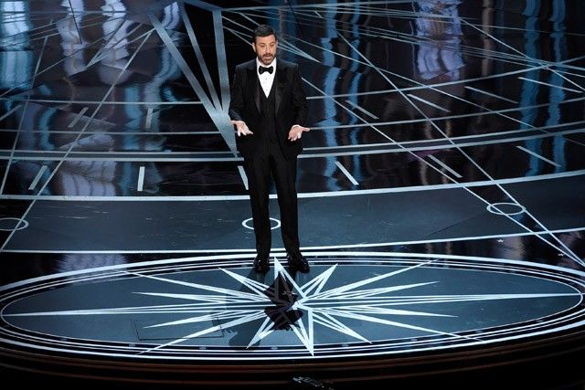 Trump on the mind at the Oscars in jokes, protest