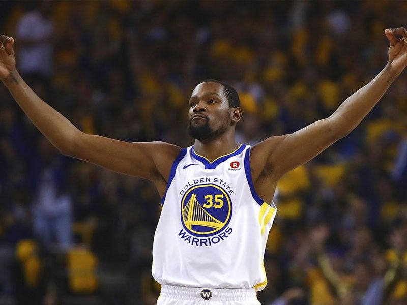 Durant, Green help Warriors knock Spurs out