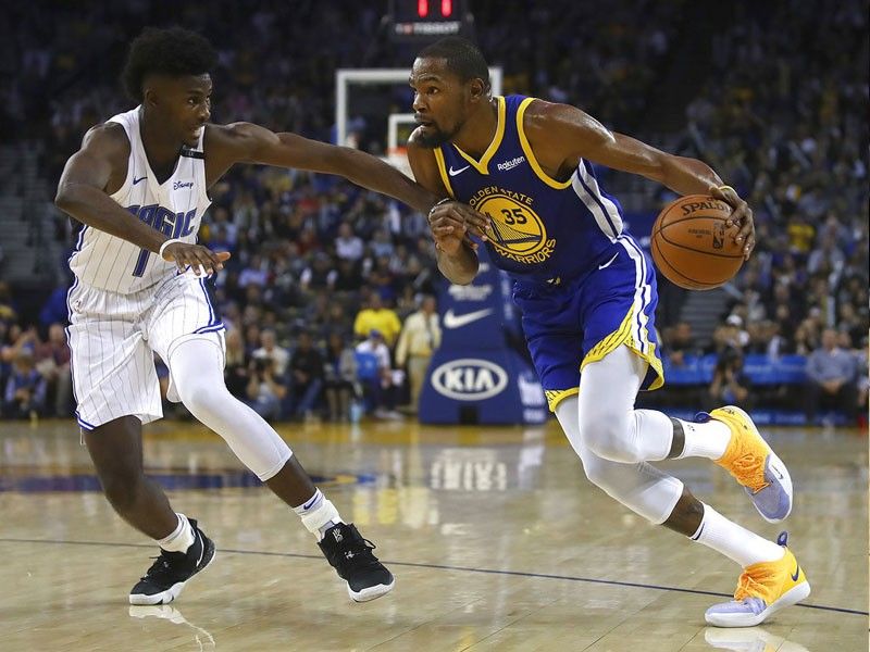 Durant explodes with 49 points as Warriors repel Magic