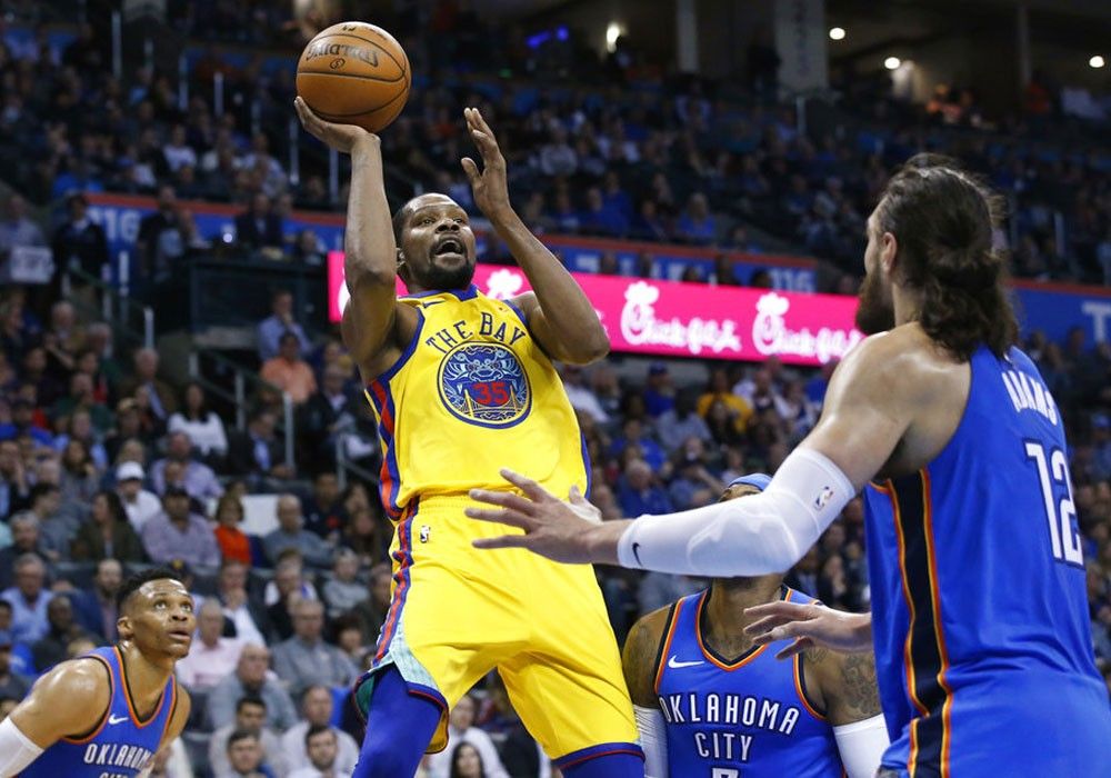 Durant plays through boos, powers Warriors over Thunder