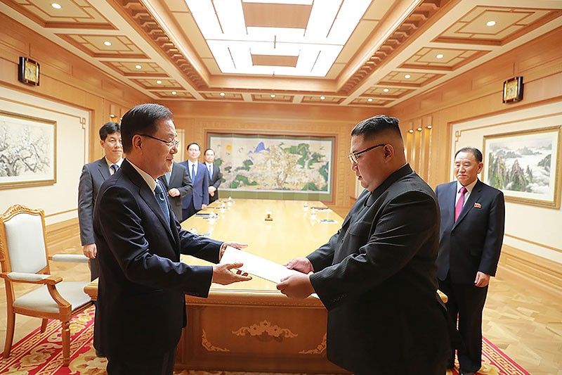 Two Koreas to hold summit as Kim renews denuclearization pledge