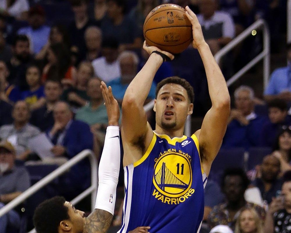 Thompson, Warriors beat Suns for 15th straight time