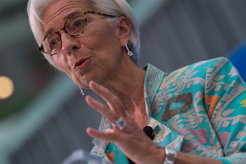 IMF's Lagarde warns economic risks have materialized, growth slowing