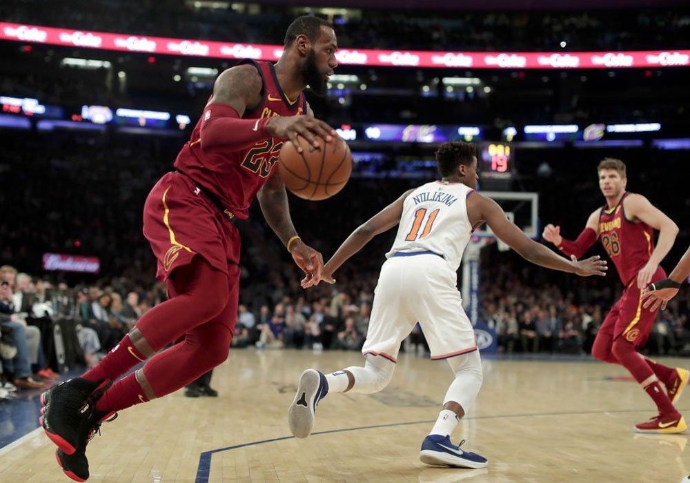 James, Love lead Cavs past Knicks to 50th win, Central title