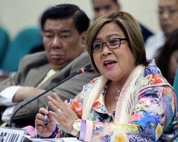 De Lima: Report on police death squad 'true'