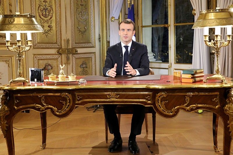 Macron unveils new measures in bid to end 'yellow vest' revolt