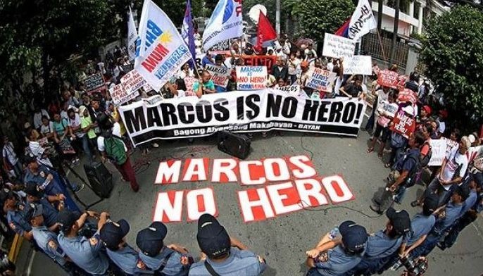 Burying Marcos at Libingan does not make him a hero, says Panelo