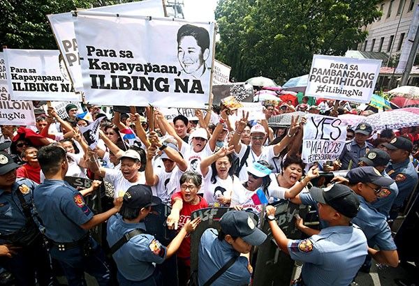 Caravan of loyalists heads for Manila to support Marcos burial