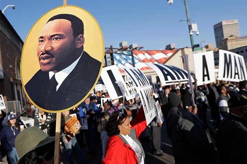 Martin Luther King honored as thousands march to 'keep the dream going'