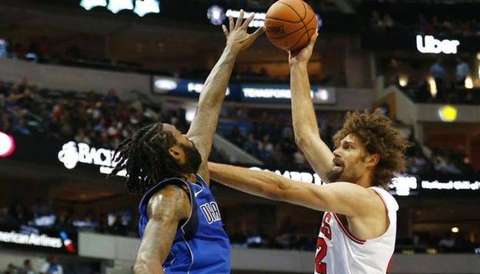 Jordan posts another double-double as Mavs subdue Bulls