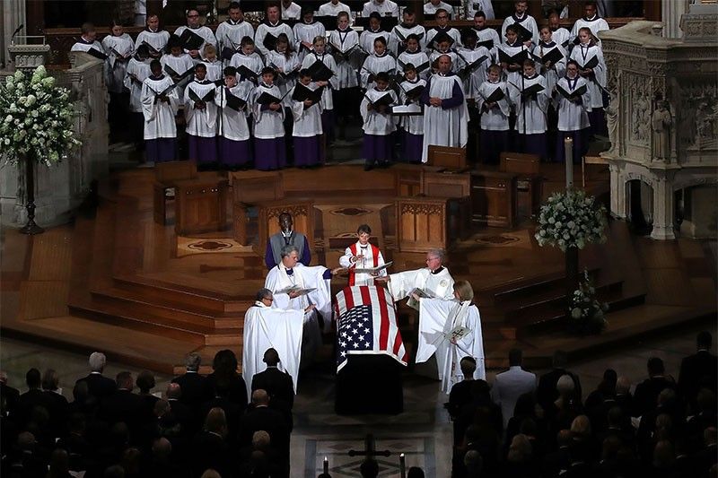After a week of bipartisan tribute, McCain is laid to rest