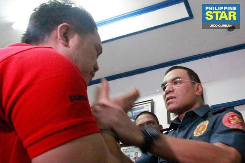 Manila cop accused of raping drug suspects' teen daughter under investigation