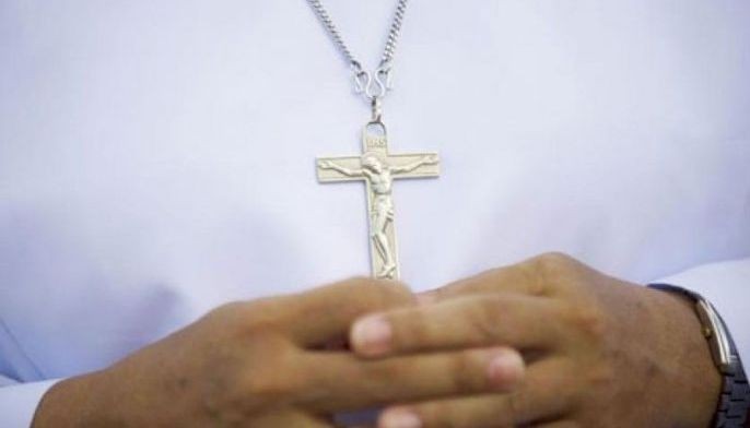 Priest accused of molesting altar boys moved to BI jail