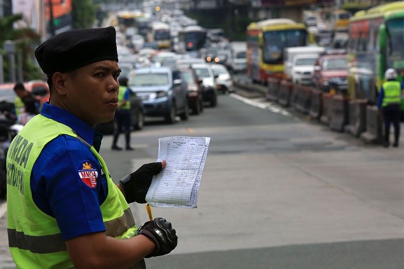 MMDA suspends implementation of EDSA 'driver-only' car ban