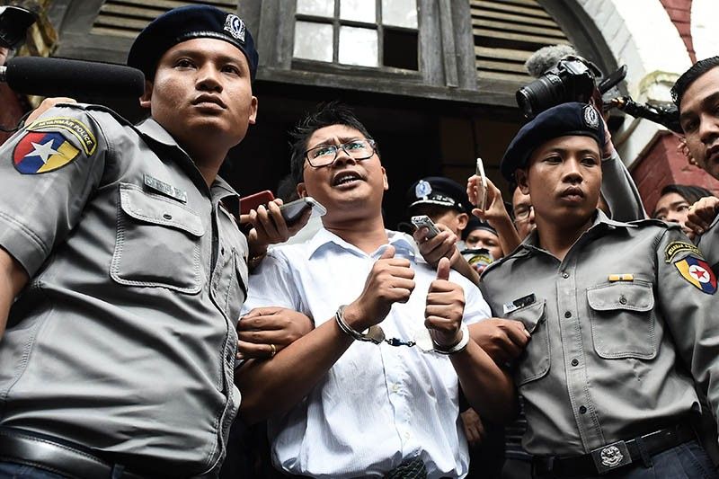 Reuters reporters jailed for seven years in Myanmar in 'state secrets' case