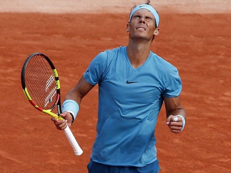 Nadal wins 11th French Open title, beats Thiem in 3 sets