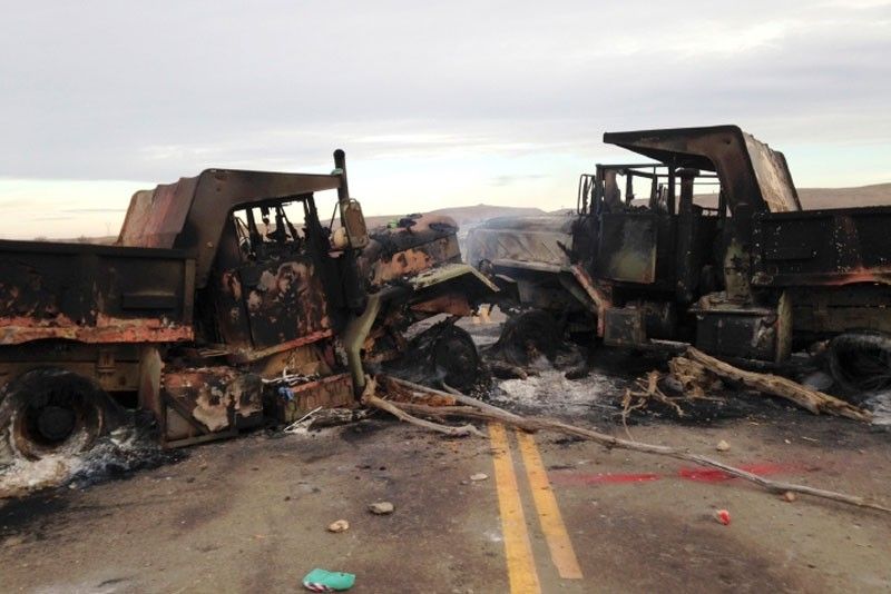 NPA torch heavy equipment in Davao