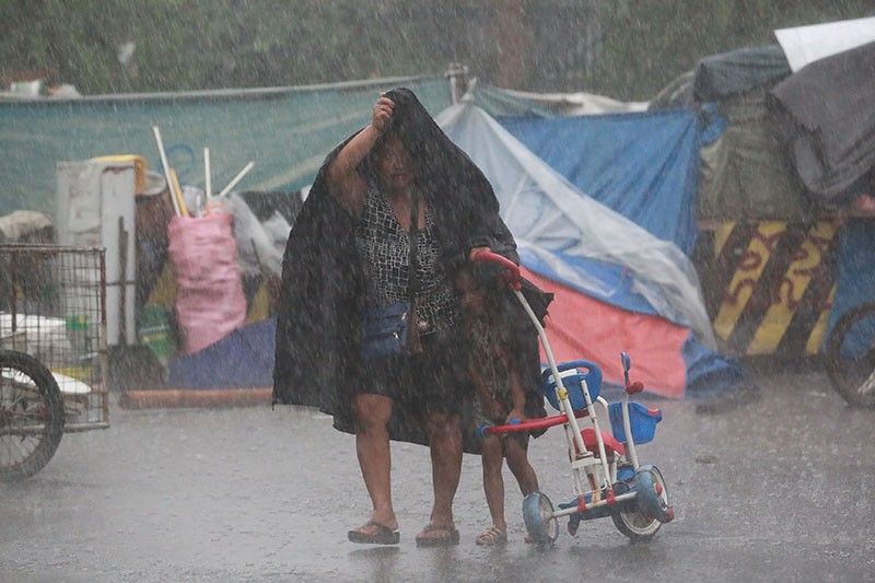 Areas in Quezon City flooded after torrential rainfall surpassing 'Ondoy' record