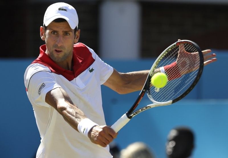 Landmark win as Djokovic reaches Queenâ��s semis