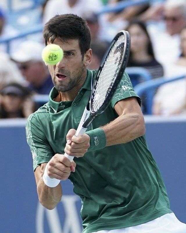 Racket-smashing Djokovic reaches Cincinnati semifinals