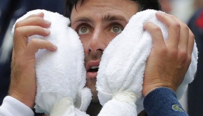 Djokovic turns to &lsquo;survival mode&rsquo; to win at steamy US Open