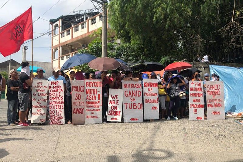 Striking NutriAsia workers, supporters face complaint