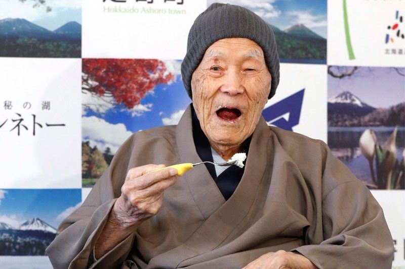 Oldest man likes soaking in Japan hot springs, eating sweets