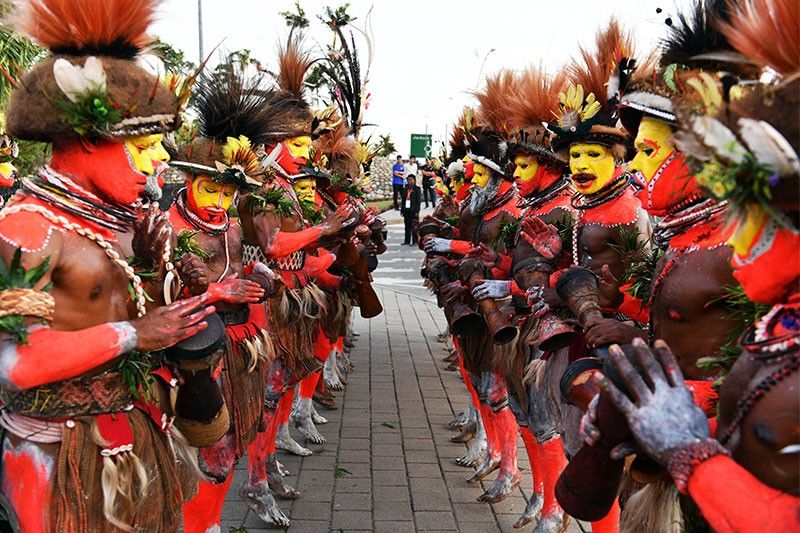 Pelt and road: Tribal welcome for Xi in Papua New Guinea
