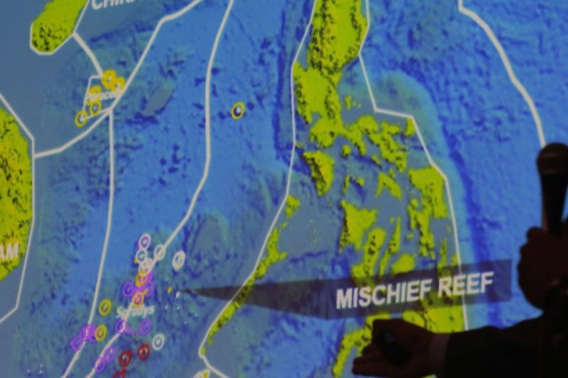 Philippines mulls protest over planes on Mischief reef