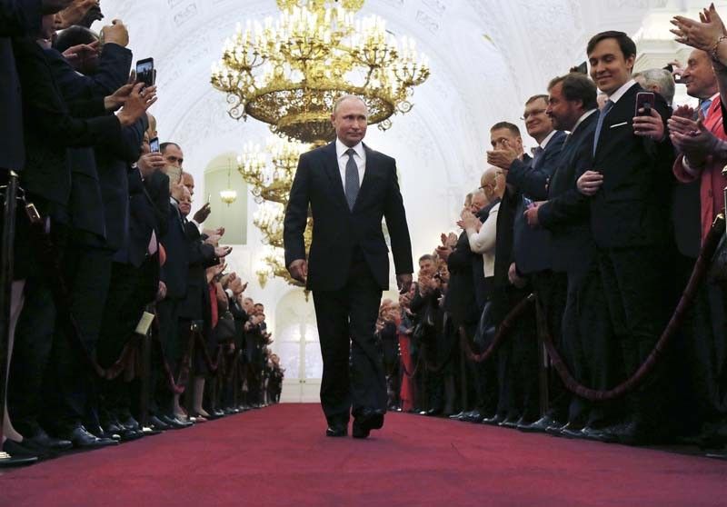 Russia's Putin sworn in for 4th term; vows economic reforms