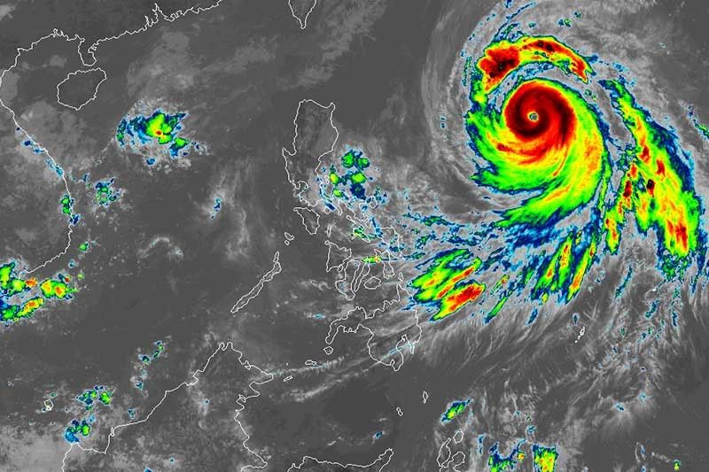 Typhoon Queenie speeds up, gains strength