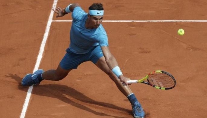 Nadal powers into 4th round with French Open streaks intact
