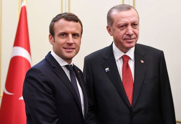 Seeking better ties with Europe, Erdogan heads to Paris