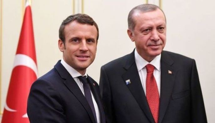 Seeking better ties with Europe, Erdogan heads to Paris