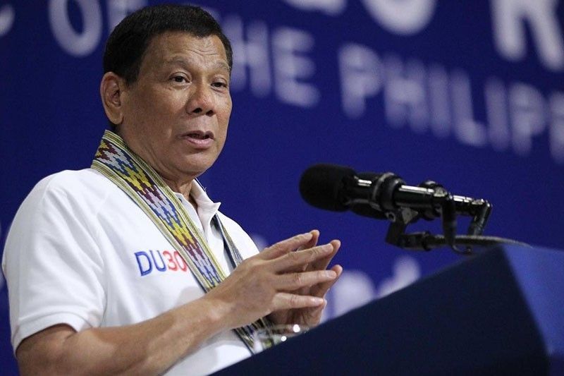 Duterte wants peace talks with Reds held in the country