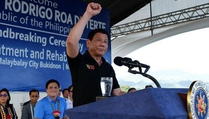 Duterte vows to pardon police convicted for 'following orders'