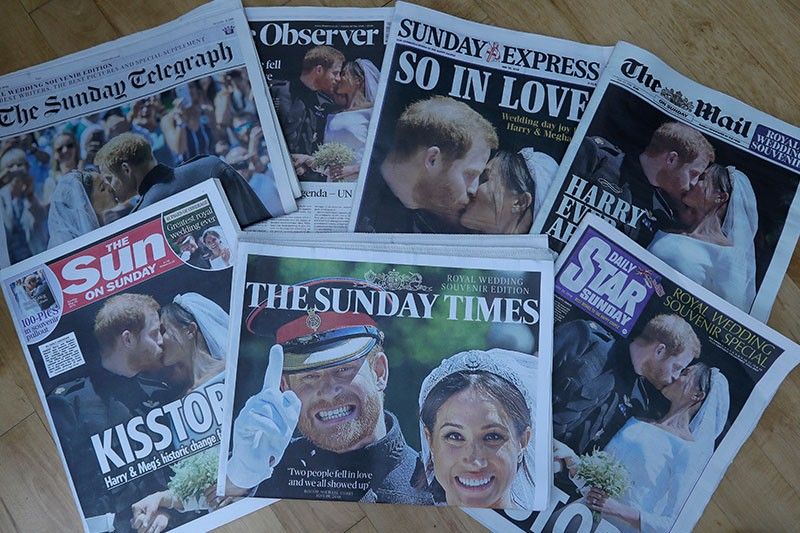 Britain basks in royal wedding afterglow; grave gets bouquet