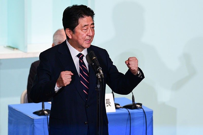 Japan's Abe cruises to party vote win, to stay as PM | Philstar.com