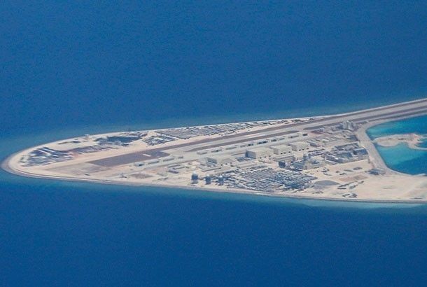 Philippine plane gets warning for flying near Chinese man-made island